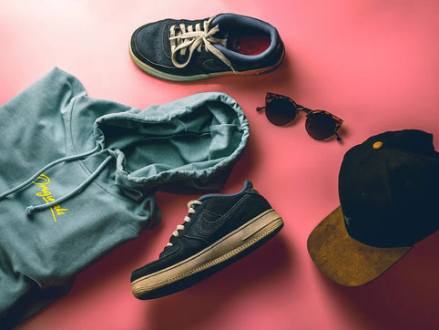 Flat lay of a stylish F1 race-day outfit