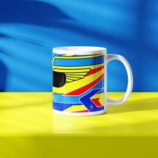 Fernando Alonso F1 helmet mug design in a minimalist style, featuring a blue and yellow background with blue, yellow and red livery with wing graphics, inspired by his Aston Martin 2024 Formula 1 helmet.